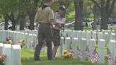 No veteran forgotten: Black Hills National Cemetery volunteers place flags on graves