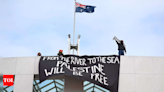 Pro-Palestine supporters climb roof of Australia’s Parliament House - Times of India