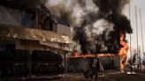 AP PHOTOS: In Ukraine, searing images capture a year of war