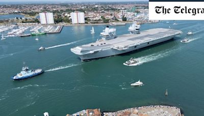 Pictured: Crowds see off HMS Prince of Wales as £3bn carrier leaves port for ammunition