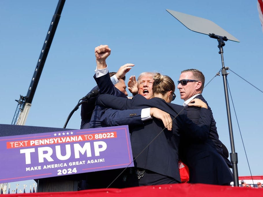 Trump rally shooting draws flood of condemnation, support for the former president, and wild conspiracy theories