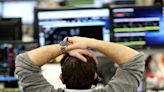 FTSE 100 ends higher as financials rise on moves to reform sector