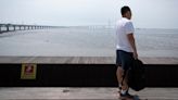 After Escaping China by Sea, a Dissident Faces His Next Act