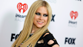 Avril Lavigne hits the red carpet in ripped Green Day shirt: 'She does not age a single day'