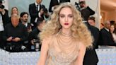 Amanda Seyfried Wears a Naked Dress with Gold Chains to the Met Gala