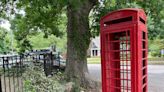 Hello, Governor! How did a red, British phone booth end up on a Raleigh street corner?