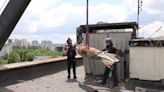 Rescuers remove 500kg bomb from Kharkiv roof