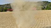 A dust devil was caught on camera forming right on top of South Carolina beachgoers