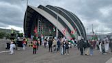 Palestine and climate activists confront Barclays at chaotic shareholder meeting