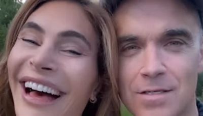 Ayda Field breaks down in tears while discussing husband Robbie Williams' documentary and admits seeing his 'deep pain' was 'so upsetting'