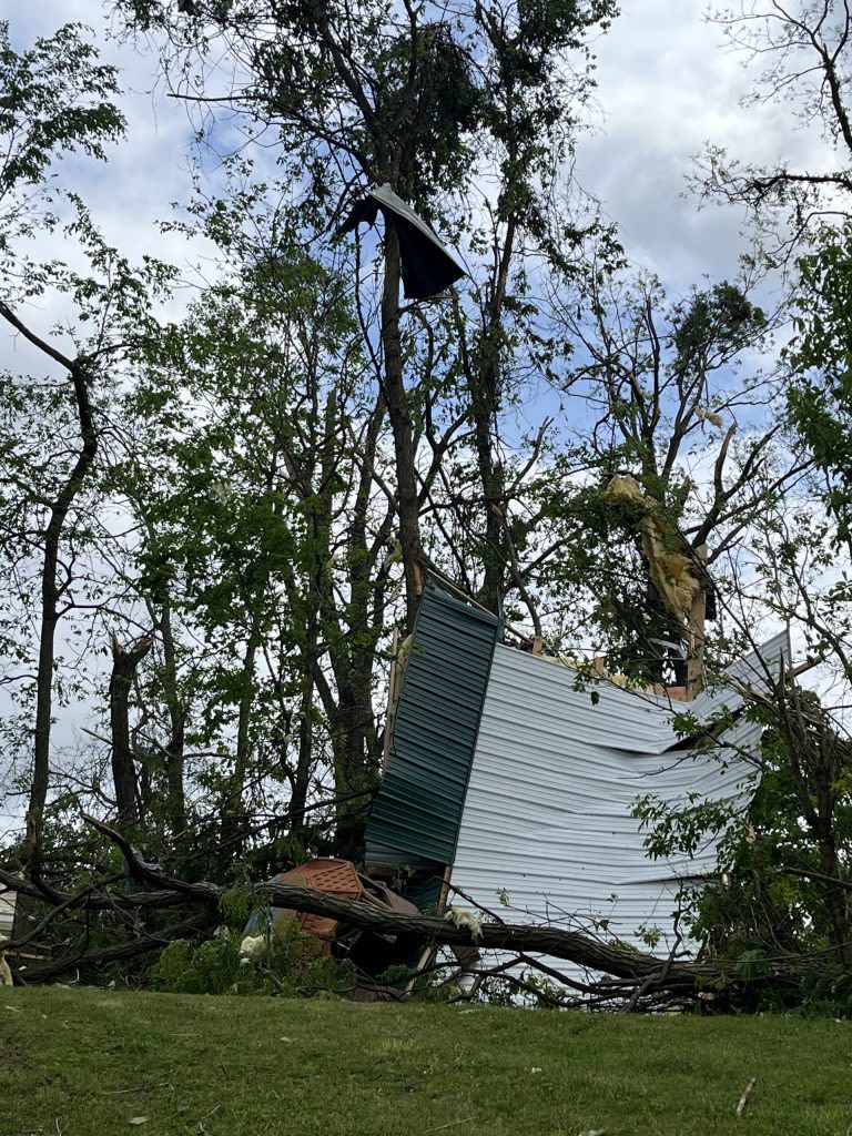 Residents, churchgoers recall tornado touchdown, begin clearing debris