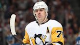 Evgeni Malkin changes course, re-signs with Penguins on 4-year deal