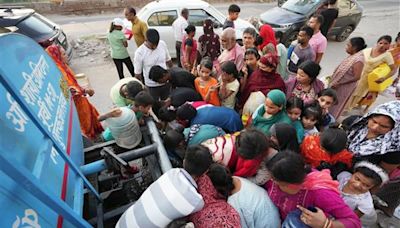 Delhi water crisis: Long queues continue to form at tankers across the city