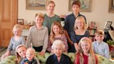 A newly released photo shows the Queen with some of the youngest royals. Meet her 12 great-grandchildren, 5 of whom are commoners.