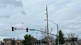 Which two Redding intersections are getting red-light traffic cameras?