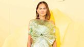 Chrissy Teigen Shimmers in Quirky Lime-Green Dress at Cult Gaia Runway Show in L.A.
