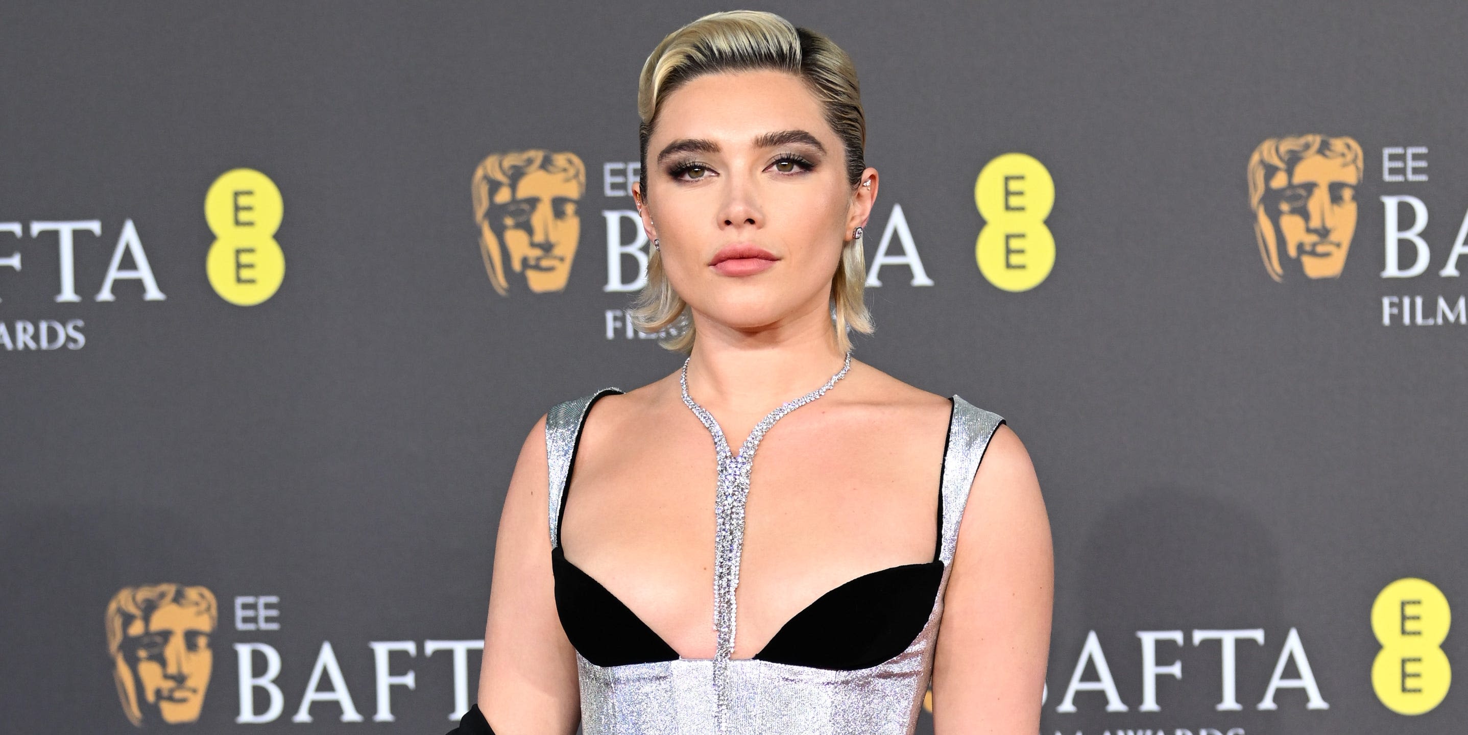 Business babes flash their bras, according to Florence Pugh