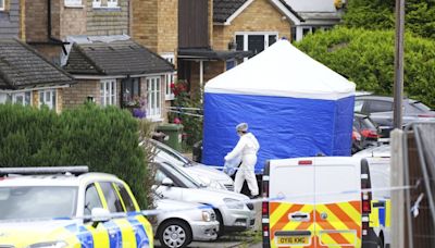 UK police are searching for a man with a crossbow after BBC radio commentator's family is killed