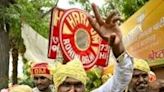 Supporters of India's Hindu-nationalist Bharatiya Janata Party (BJP) celebrate during vote counting on Tuesday