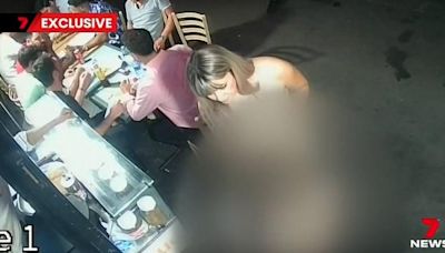 CCTV shows moment member of Paris 'rape gang' grabs victim in kebab shop