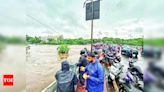 Citizens defy safety warnings to witness swollen Mutha river | Pune News - Times of India