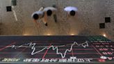 Asian stocks fall on inflation jitters, China buoyed by more stimulus