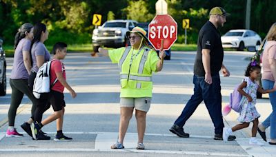 Mandarin Oaks Elementary crossing guard keeps watch on first day of school