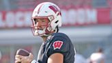 Wisconsin fans react to Tanner Mordecai’s first touchdown pass as a Badger