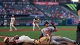 Cardinals edge Angels for third straight victory