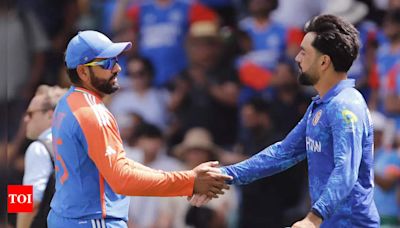 'Bambai se aaya...': Rashid Khan shares photo with Rohit Sharma after Afghanistan enter semifinals | Cricket News - Times of India