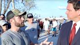 DeSantis Gives Interview To Jan. 6 Attendee Wearing ‘Three Percenters’ Militia Insignia