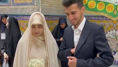 Watch: Newlywed Couples Cast Their Vote In Iran’s Presidential Election