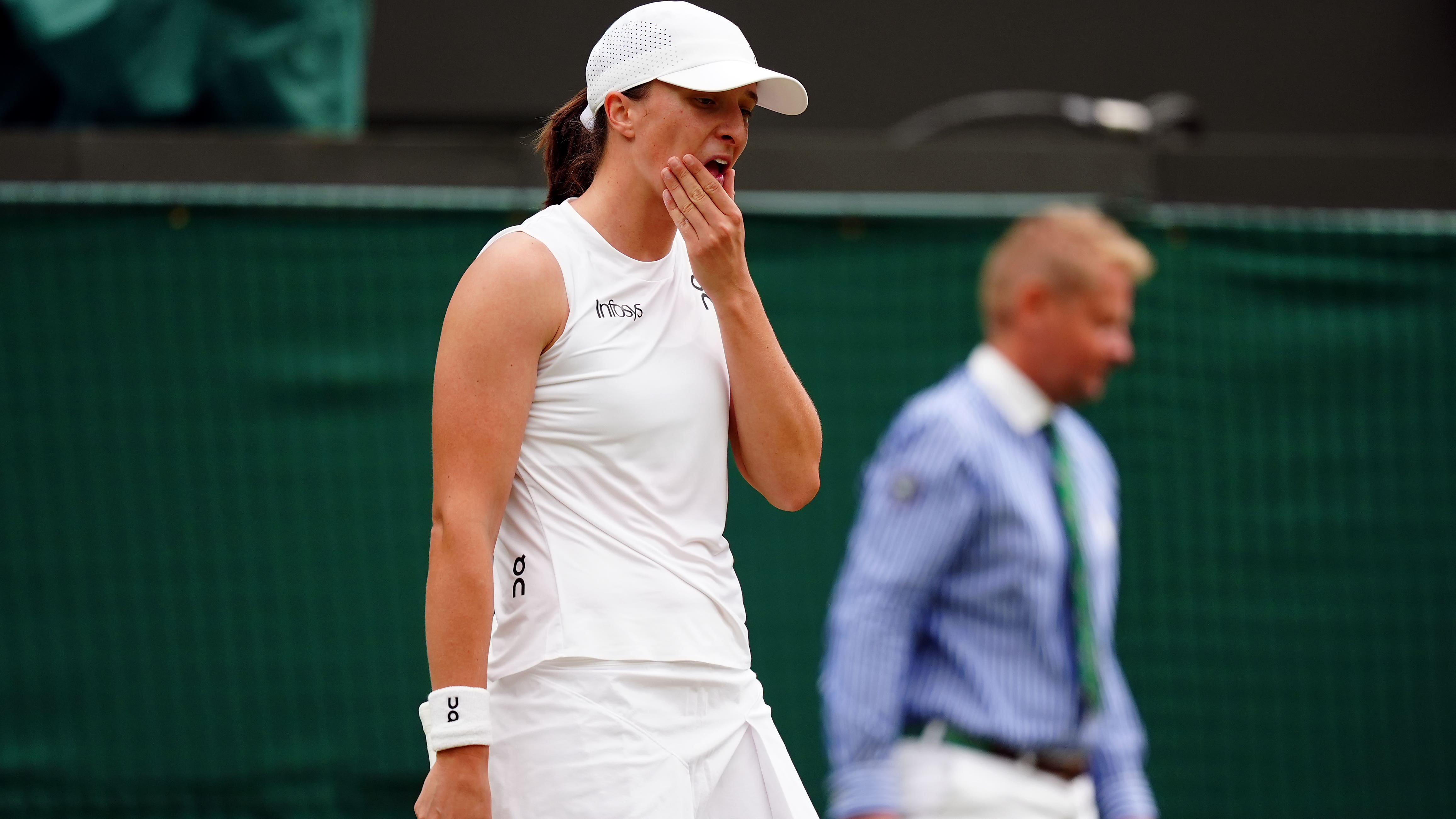 World number one Iga Swiatek out of Wimbledon as 21-match winning streak ends