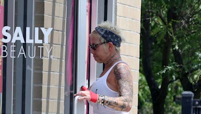 Eminem's ex stocks up on beauty products after being seen asleep in her car