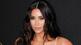Kim Kardashian Flaunts Toned Figure in Metallic Gold Bikini During 'Night Swim'