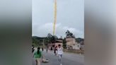 Watch: Bright orange rocket debris rains down on terrified villagers in China