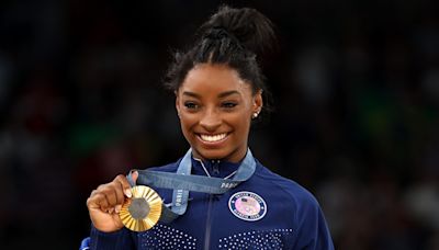 Brilliant Simone Biles matches the great Nadia Comaneci as she lands ninth Olympic medal