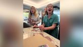 Woman surprises sister with fake lottery ticket pregnancy reveal