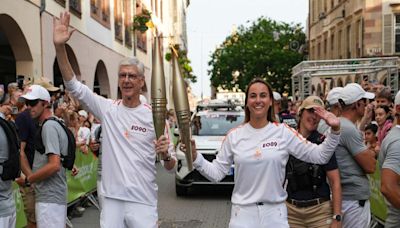 Islander transfers Olympic flame to football legend in Strasbourg