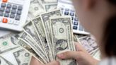 Dollar holds its ground as key inflation data looms