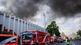 Dramatic moment factory engulfed in flames as locals warned of 'toxic gas'