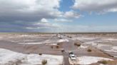 Floodwaters inundate Minnesota towns while another storm transformed New Mexico village into a lake