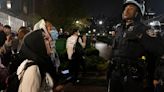 Biden keeps quiet as Gaza protesters and police clash on college campuses