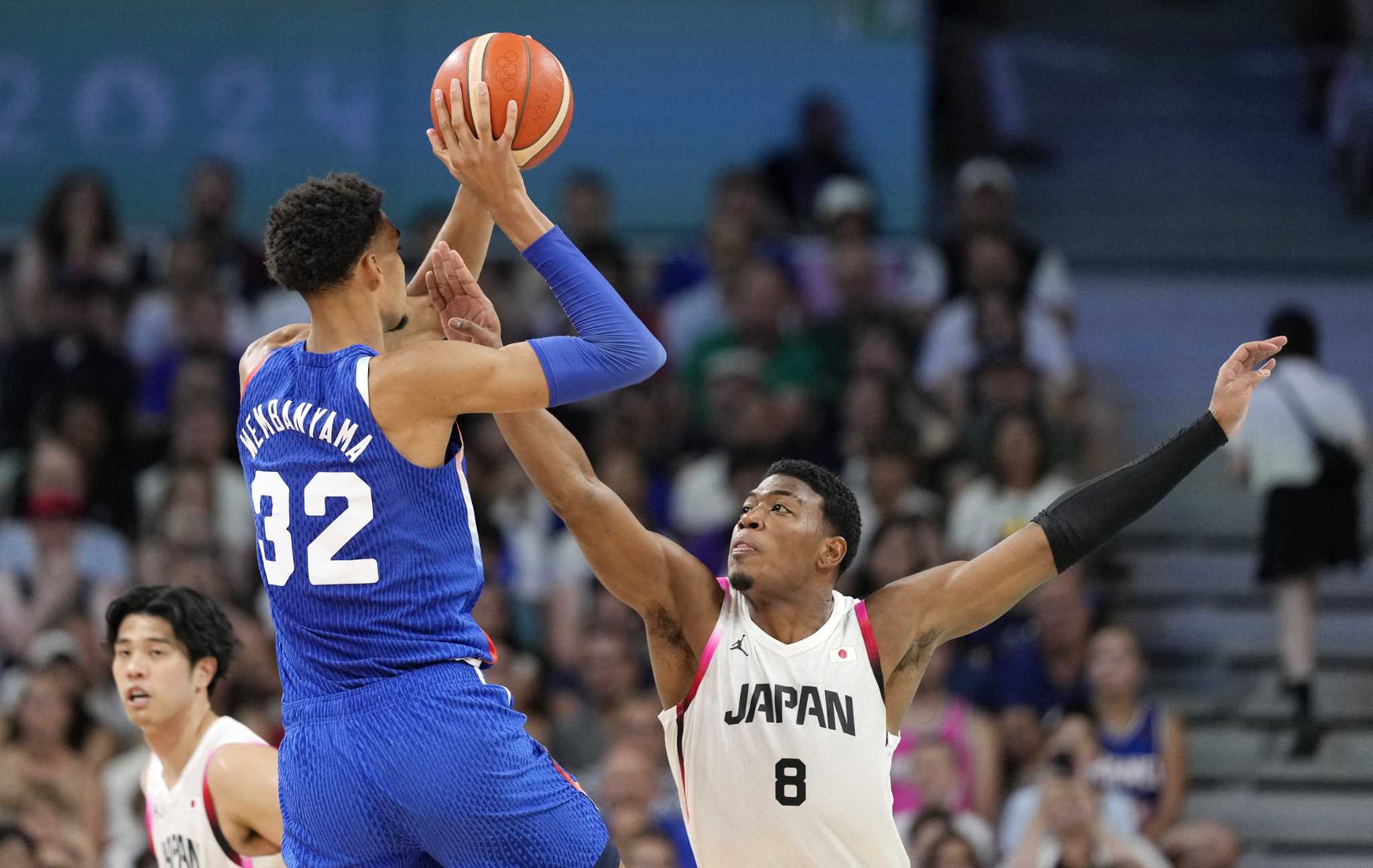 Wembanyama takes over in OT, helps France escape a serious challenge from Japan at the Paris Games