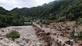 Death toll in China mudslide rises to 21, with six people missing