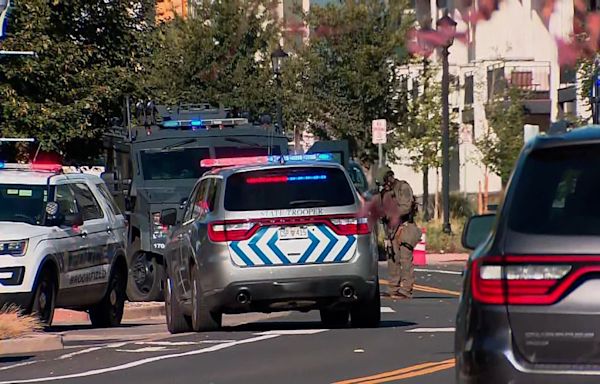 A suspect is in custody following a shooting at a Denver-area apartment complex, police say