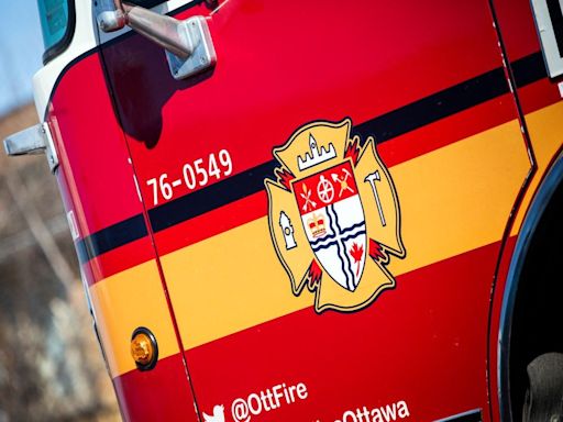 Garage fire spreads to roof of house in west Ottawa