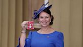 Woman who ran marathons dressed as fruit made an MBE