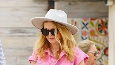 Heather Graham, 54, shows off her toned legs in hot pink co-ord