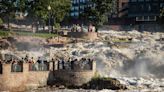 Midwest flooding collapses a rail bridge, forces evacuations and kills at least 1